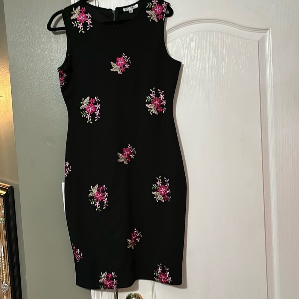Beautiful black embellished dress with floral designs by Olivia Matthews